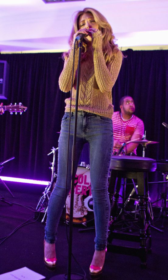 Nicola Roberts Proved Even Jeans And A Knitted Jumper Look Super-Hot With A Pair Of Statement Heels At Her Concert In London. 2011