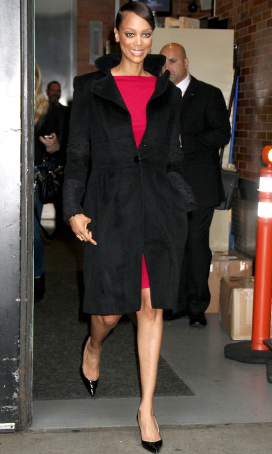 Tyra Banks Also Wrapped Up In A Classic Black Coat As She Arrived At The Good Morning America TV Show, 2011