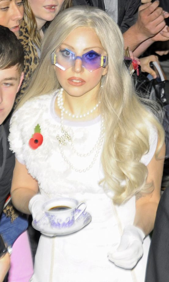 Lady Gaga Hits London With A Cup Of Tea, Hexagon Sunglasses And Chanel Neck Candy…