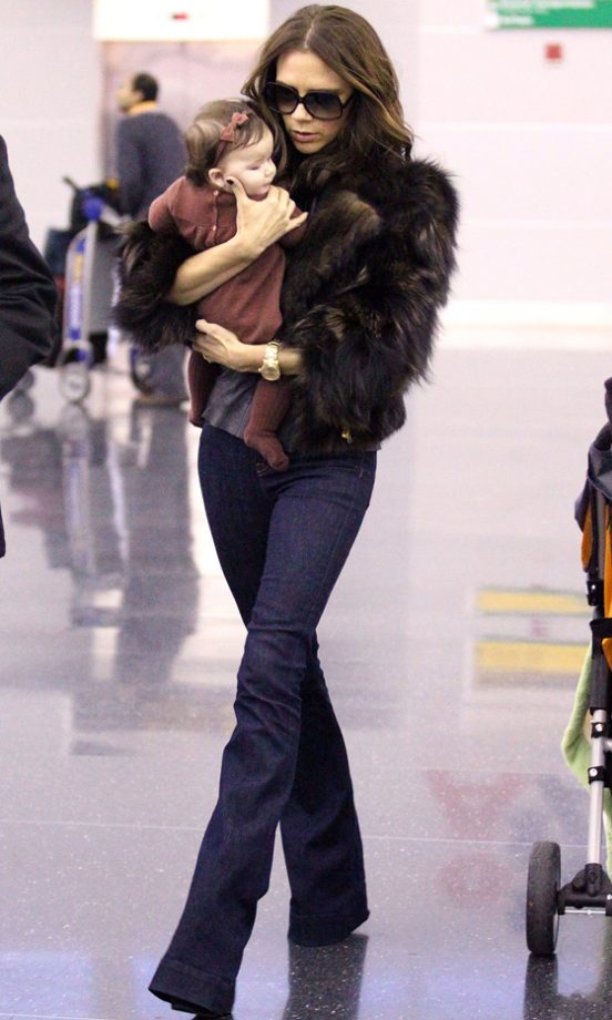 Victoria Beckham And Harper Beckham Both Colour Co-ordinated Wearing Brown, 2011