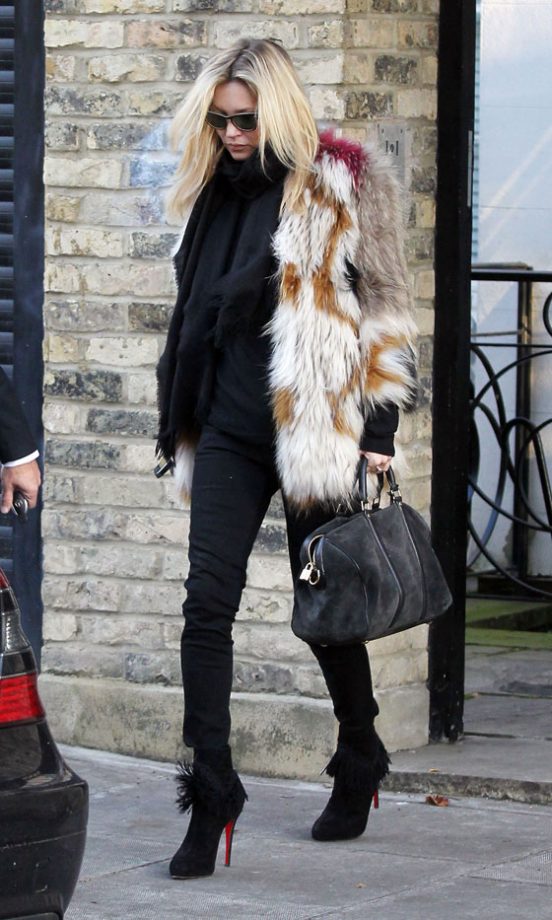Kate Moss Stepped Out In London Wrapped Up In A Furry Coat And Pap-Deflecting Black Sunglasses. 2011