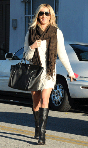 Ashley Tisdale is the second celebrity this week to wear a cream cable knit dress while out and about in LA