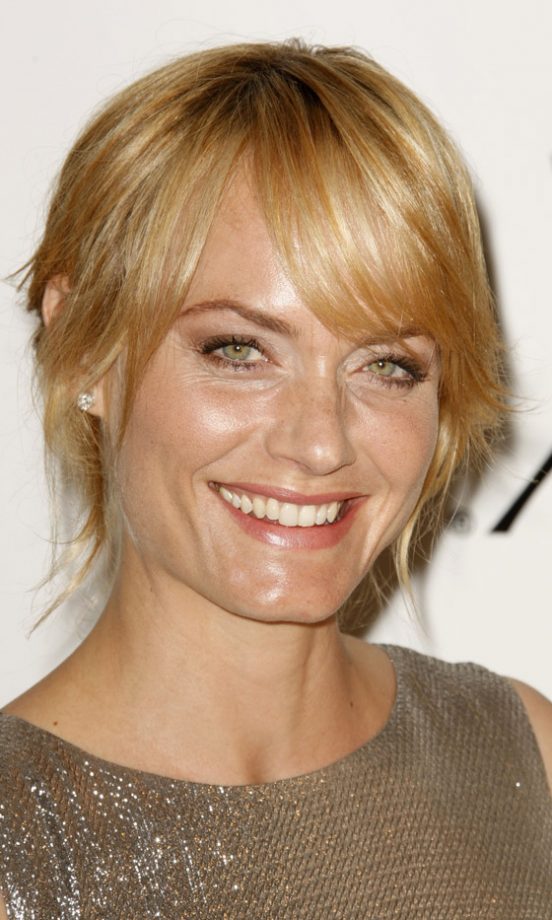 Amber Valletta Looks Effortlessly Chic With A Highlighted Fringe Hairstyle, 2010