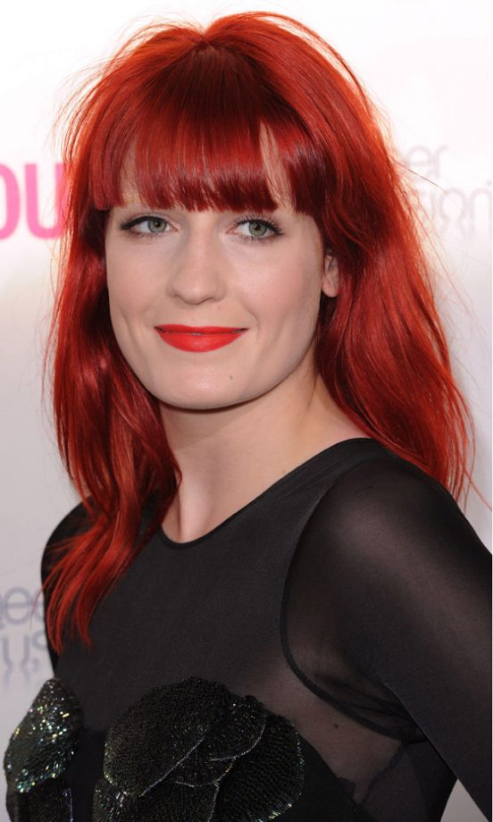 Florence Welch Looks Fierce With A Statement Red Hairstyle Complete With Forehead-Covering Fringe, 2010