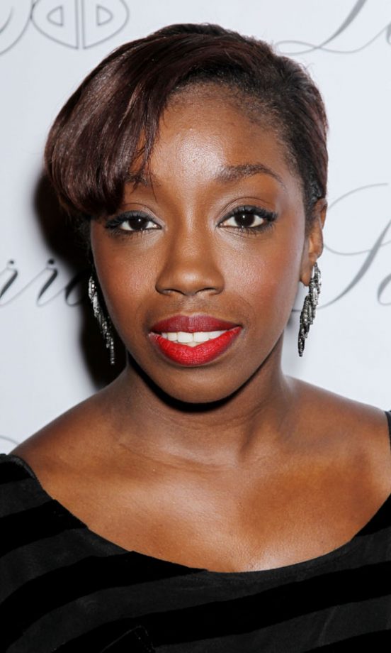 Estelle Adds Glamour To Her Little Black Dress With A Bright Red Lipstick, 2010