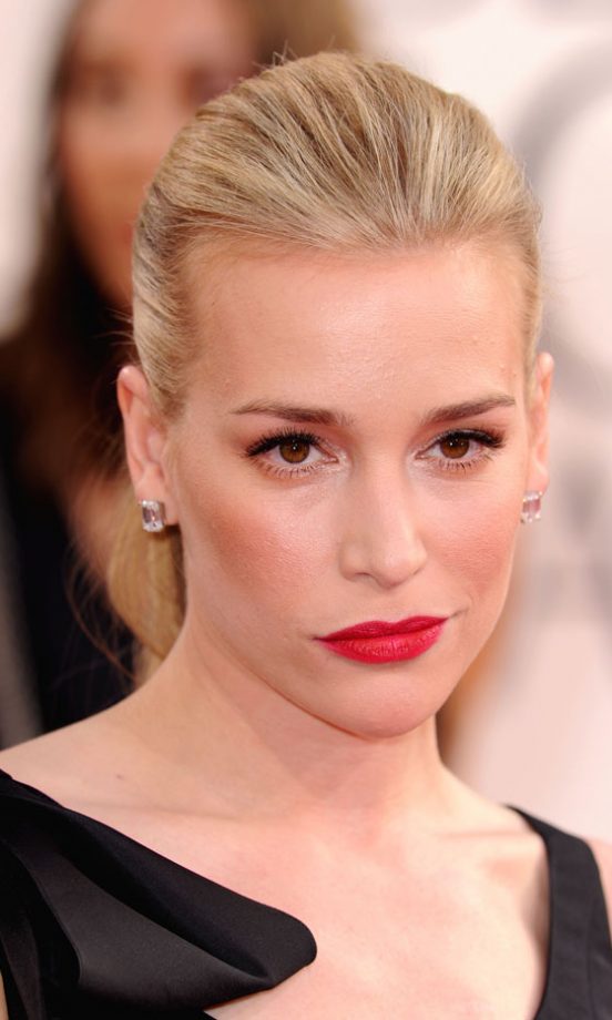 Piper Perabo Accentuates Her Red Lipstick With A Slicked Back Hairstyle, January 2011