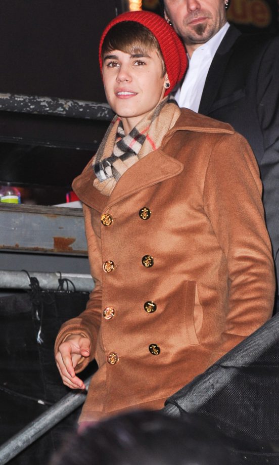 Justin Bieber Wrapped-Up In A Red Hat And Winter Coat, 2011