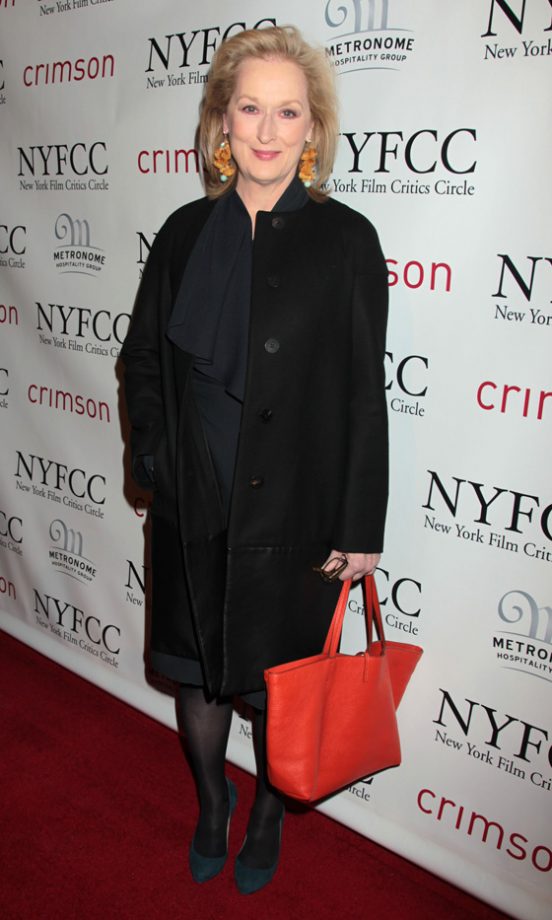 Meryl Streep Added Interest To Her Simple Black Outfit With A Colour-Pop Bag At The Film Critics Circle Awards 2012