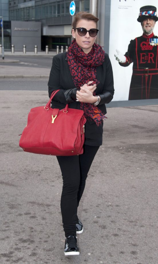 Coleen Rooney Ditched Her Designer Heels At Heathrow Airport 2012