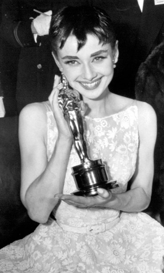 An Oscars Classic: Audrey Hepburn With Her Award For Roman Holiday At The 1954 Academy Awards