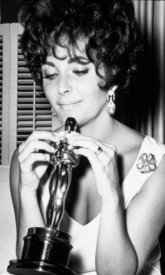 Elizabeth Taylor With Her Oscar For Best Actress At The 1961 Academy Awards