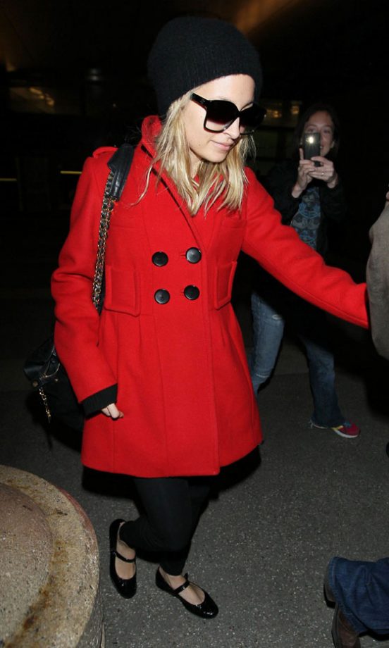 Nicole Richie Adds A Touch Of Glam To Her Airport Outfit With A Statement Coat By Sonia Rykiel, 2011