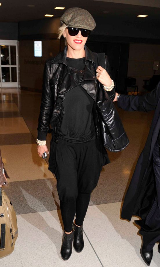 Gwen Stefani Nearly Slips Through The Radar, But Her Trademark Red Lippy Is An Instant Give Away, October 2009