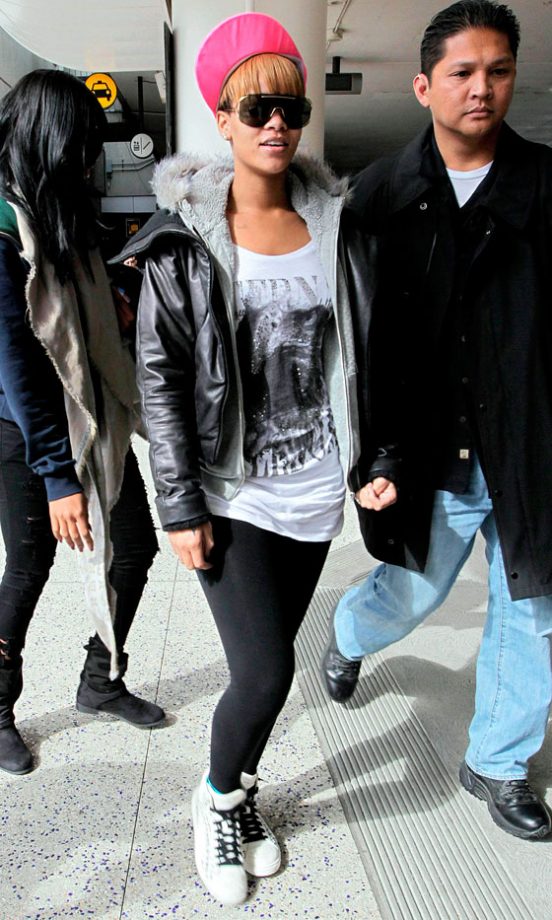 Pop Of Pink: Rihanna Arrives At LAX, March 2010