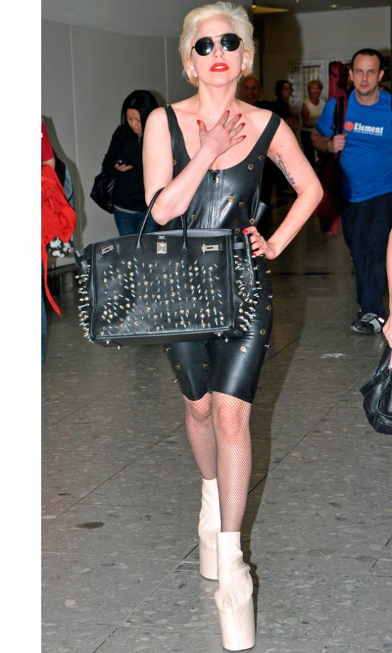 Lady Gaga: Never One To Shy Away From A Photo Op - Arriving At Heathrow Airport, June 2010