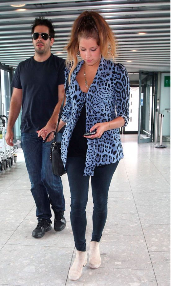 Peaches Geldof Arrives At Heathrow Airport With A Rather Suspect 80's Hair Style, June 2010
