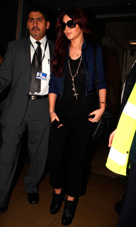 Cheryl Cole Accessorises With Celebrity Must-Have Oversized Sunglasses At Heathrow Airport, November 2010