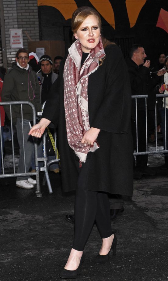 Adele Doesn't Look Too Pleased With Herself, But We're Loving Her Louis Vuitton Scarf! 2011