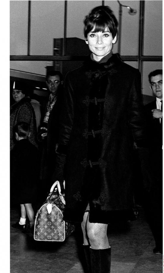 60's Glamour Puss Audrey Hepburn Arrives At Heathrow Airport With Louis Vuitton Luggage In Tow, November 1966