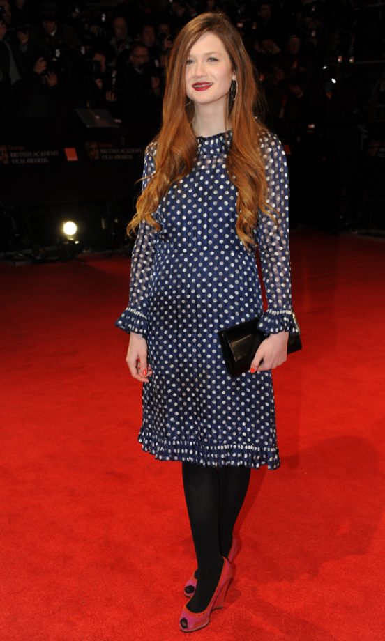 Bonnie Wright Teamed Her Vintage Dress With Prada Accessories At The Baftas 2012