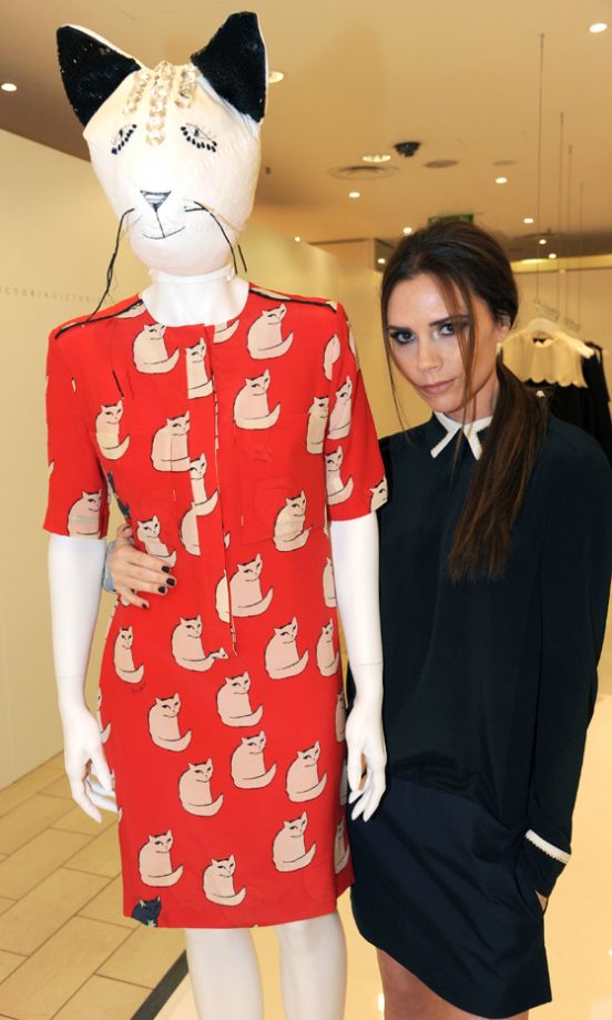 Victoria Beckham With One Of Her Designs At The Victoria, Victoria Beckham Fashion Launch, 2012