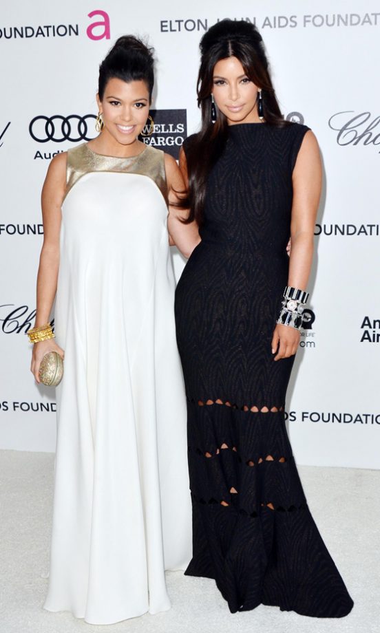 Kourtney Kardashian And Kim Kardashian At Elton John's AIDS Foundation Oscar Party 2012