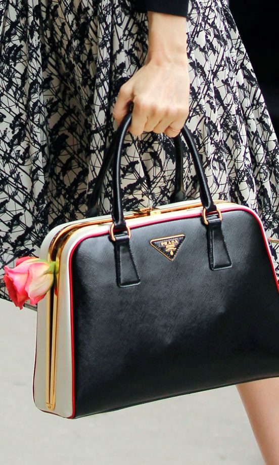 January Jones Accessorises A Prada Handbag WIth A Rose, Love It! 2012