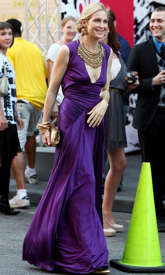 Kelly Rutherford As Lily Bass Looks Stunning In Her Regal Purple Dress And Gold Accessories, 2010