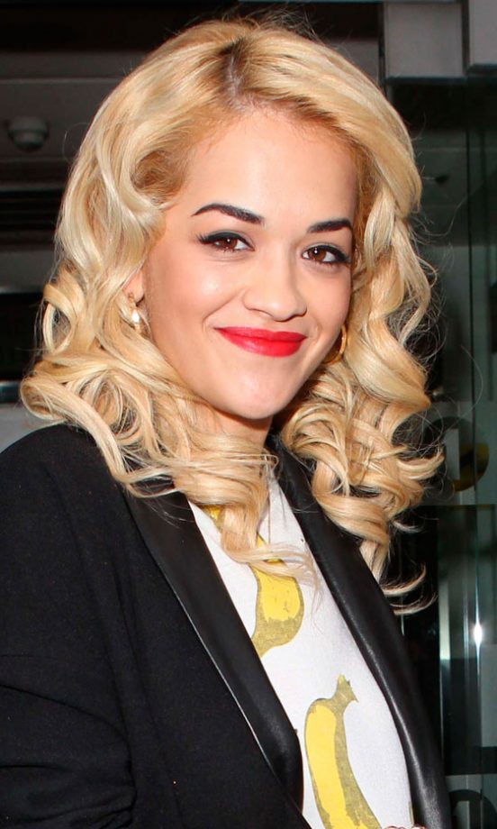 Rita Ora Compliments Her Dramatic Bombshell Make-Up With Blonde Curls, 2012