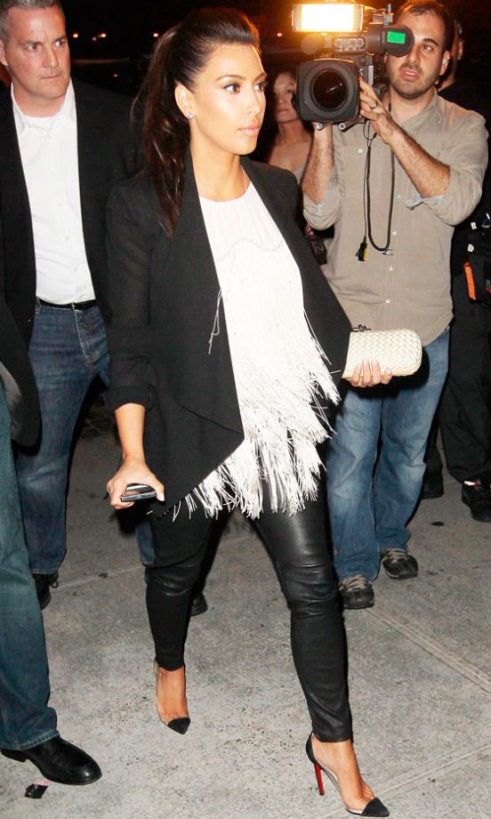 Kim Kardashian Teams Her Go-To Leather Leggings With An Eye-catching Tassel Top, 2012