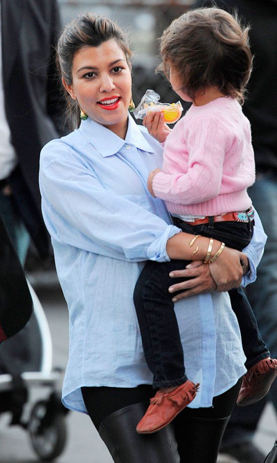 Kourtney Kardashian Rocked A Glamorous Casual Style With Red Lips And A Blue Shirt, 2012