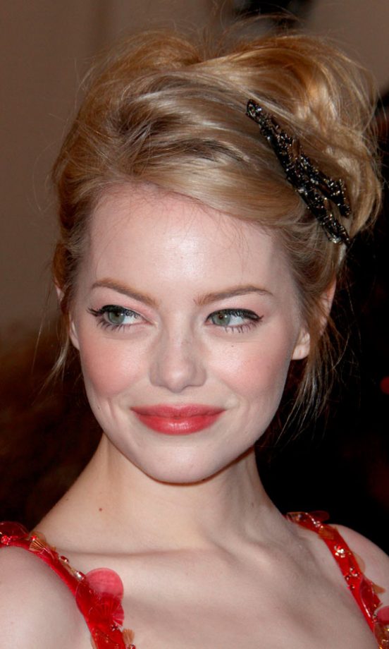 Emma Stone Finished Off Her Look With A Sleek Black Hairpiece At The Met Ball 2012