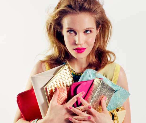 So many handbags, only two arms!