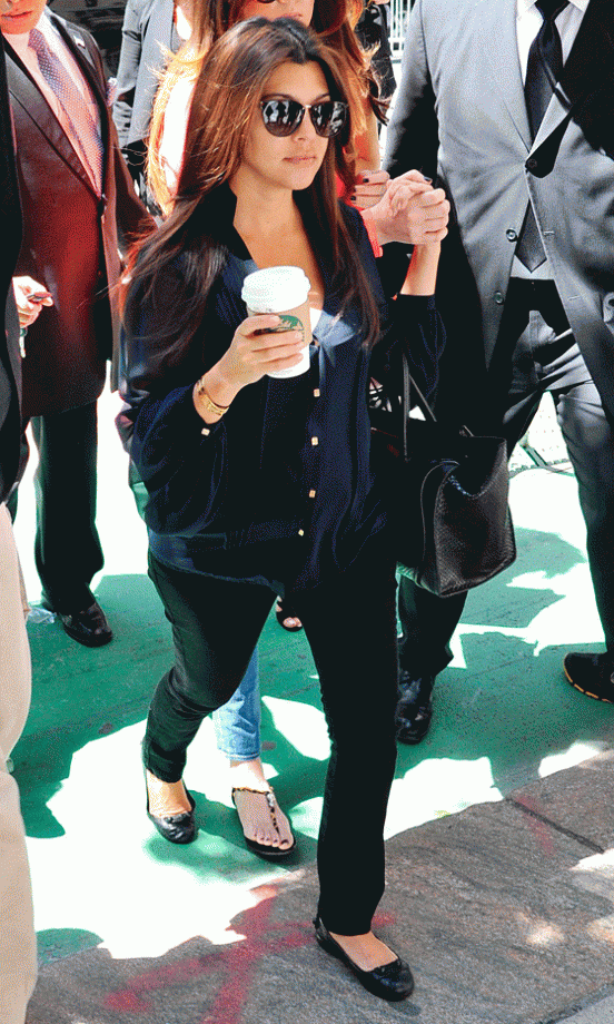 Kourtney Kardashian Cut A Sleek Fugure In This Simple Black Casual Outfit, 2012