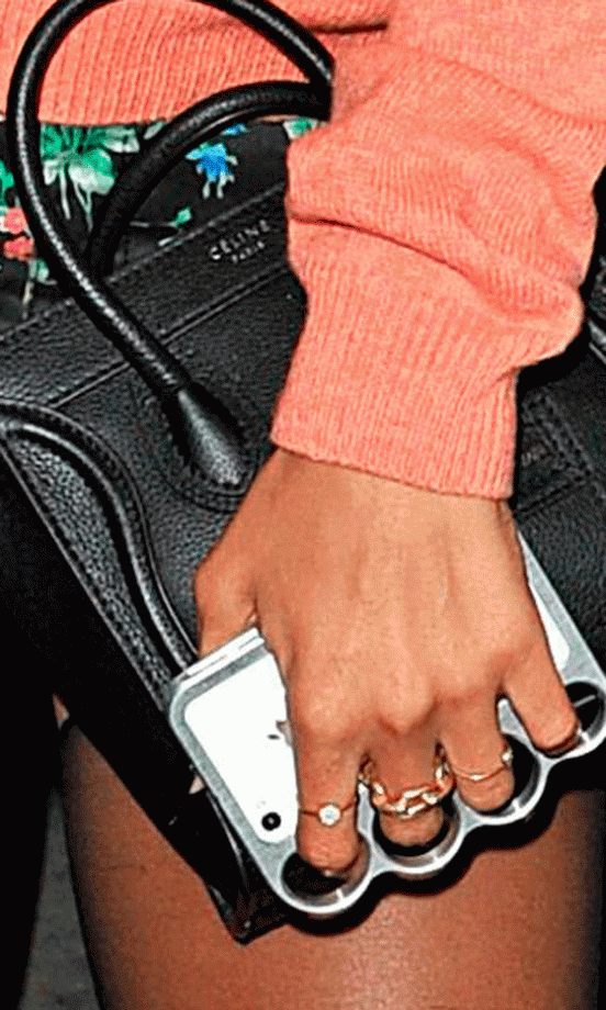 Rihanna Accessorises In Style With A Celine Tote And Cassette Ring, 2012
