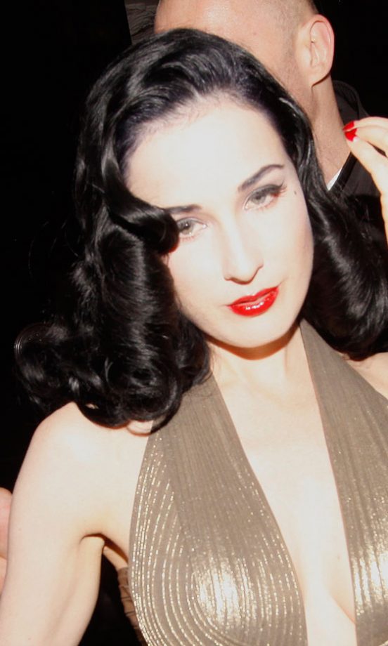 Dita Von Teese Smoulders With Her Glossy Midnight Black Curls, 2012