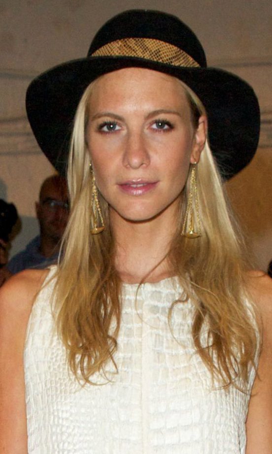 Poppy Delevingne Accessorized Her Long Hairstyle With A Cute Hat At At London Fashion Week SS13, September 2012