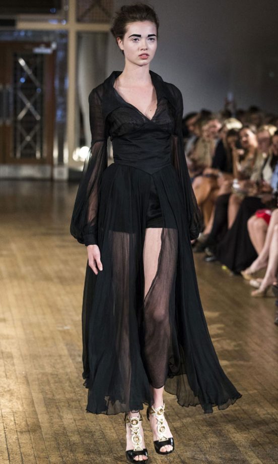 Model At The Retrospective Show At London Fashion Week SS13