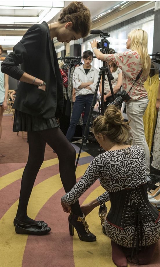Models Backstage At The Retrospective Show At London Fashion Week SS13