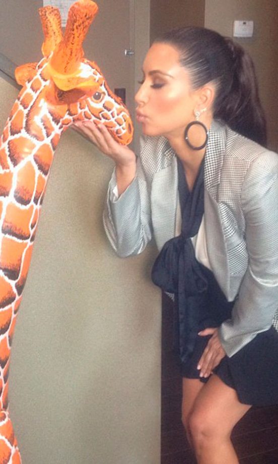 Kim Kardashian @KimKardashian Puckers Up, 2012