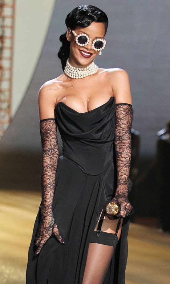 Rihanna Wears A Black Corset Dress And Lace Gloves At The Victoria's Secret Fashion Show, 2012