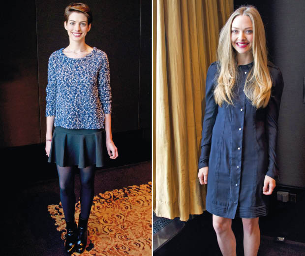 Anne Hathaway and Amanda Seyfried do off-duty cool at a Les Miserables press conference in New York