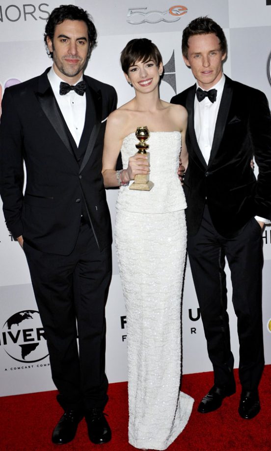 Sacha Baron Cohen, Anne Hathaway And Eddie Redmayne At The Golden Globes NBC Universal Party, 2013