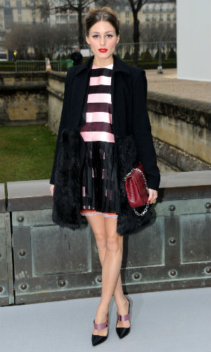 Olivia Palermo looked gorgeous in a striped Dior dress at the Dior show during Paris Fashion Week