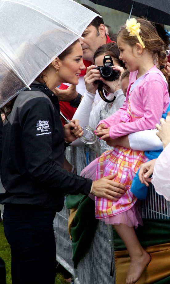 Kate Middleton, Duchess Of Cambridge, With with A Child In Dalvay-By-The-Sea, 2011