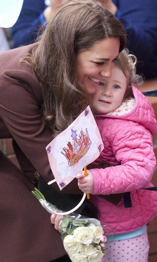 Kate Middleton, Duchess Of Cambridge, With A Child At Alder Hey Hospital, 2012