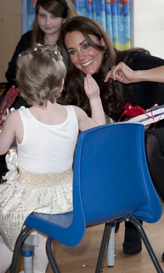 Kate Middleton, Duchess Of Cambridge, With A Child At Alder Hey Hospital, 2013