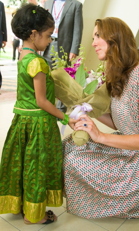 Kate Middleton, Duchess Of Cambridge, With A Child In Singapore, 2013