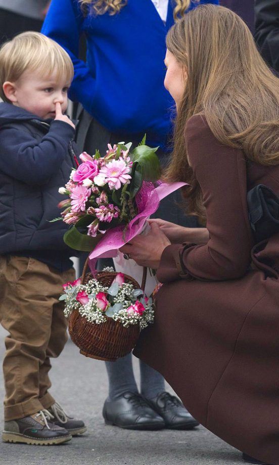 Kate Middleton, Duchess Of Cambridge, With A Child On A Visit To Grimsby, 2013