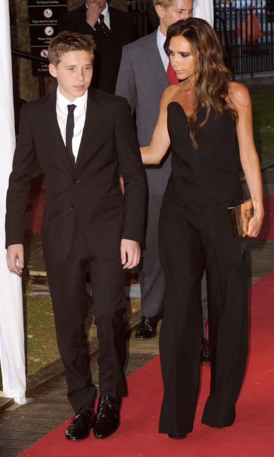 Brooklyn And Victoria Beckham At The Women Of The Year Awards, 2013
